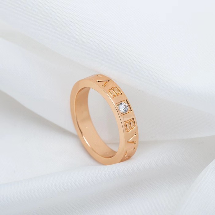 Single diamond letter ring