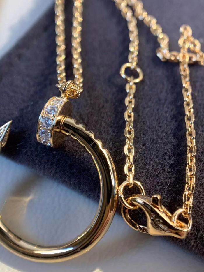 Small diamond nail necklace