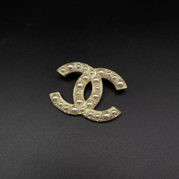 Diamond plated brooch