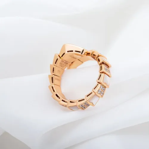 Serpentine diamond ring