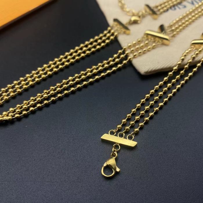 Gold three layer bead bracelet necklace