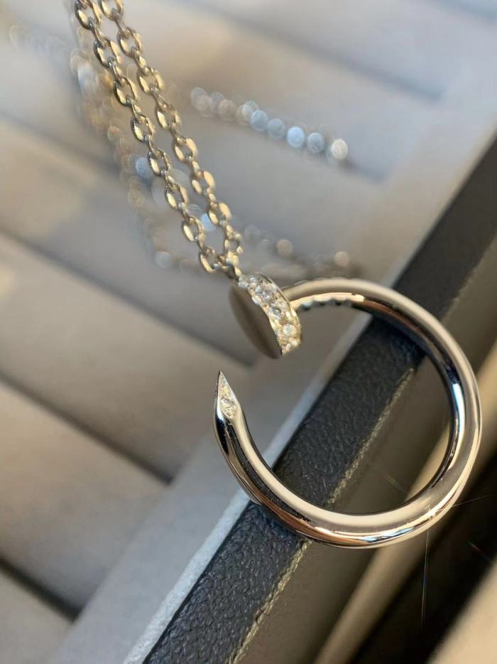 Small diamond nail necklace