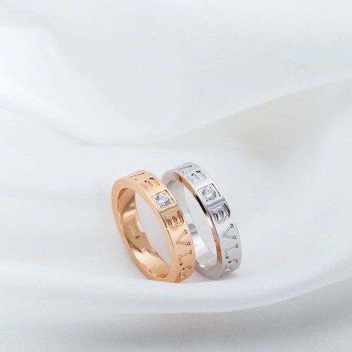Single diamond letter ring