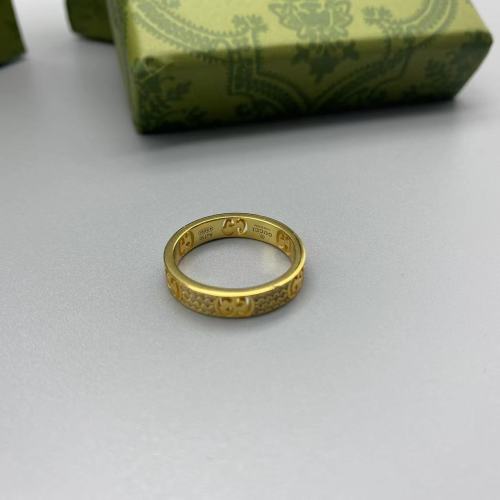 Gold diamond inlaid logo ring
