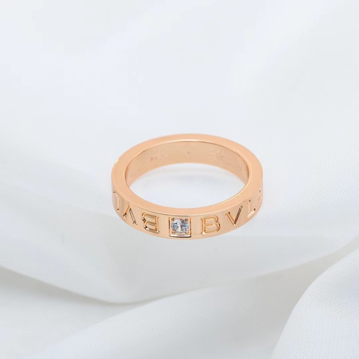 Single diamond letter ring