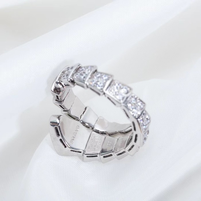 Serpentine diamond ring