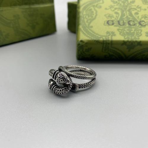 Double snake circling ring