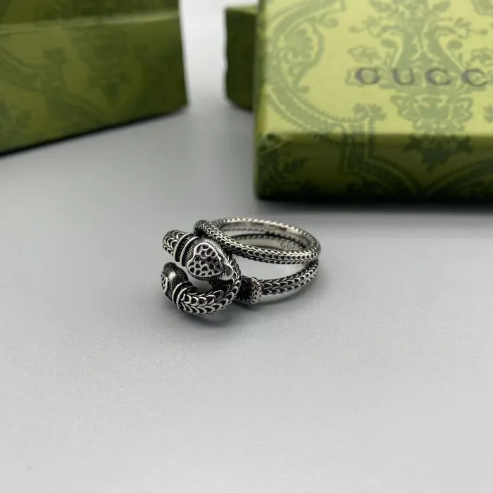 Double snake circling ring
