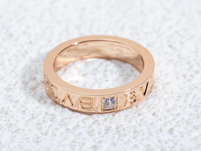Single diamond letter ring