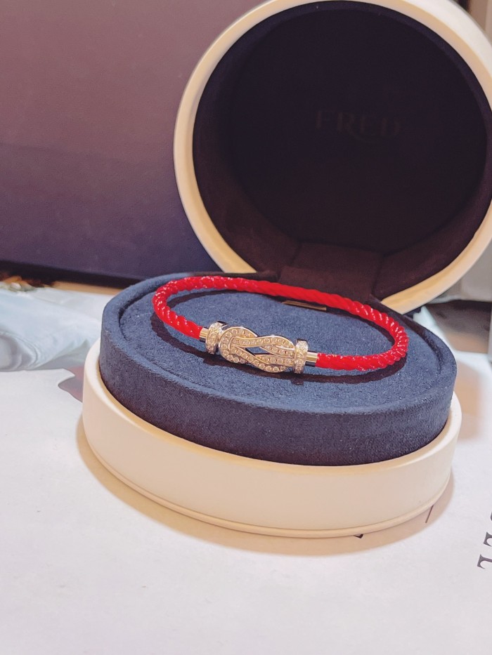 Small red nylon rope bracelet