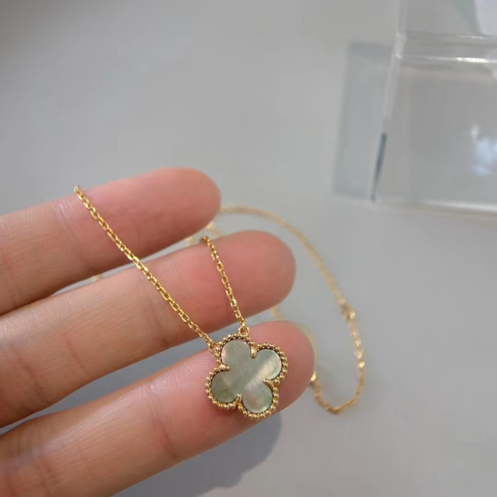 White Fritillaria with four-leaf necklace