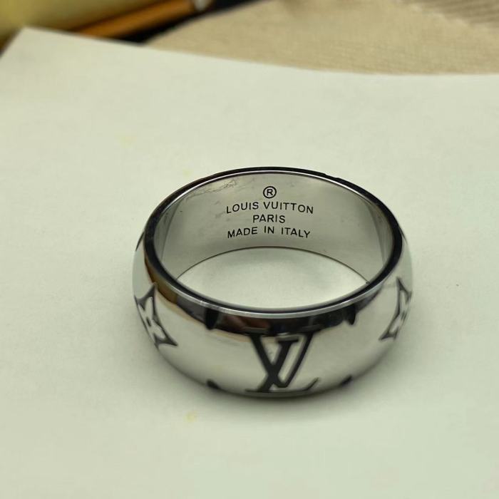 Smooth embossed black logo letter ring