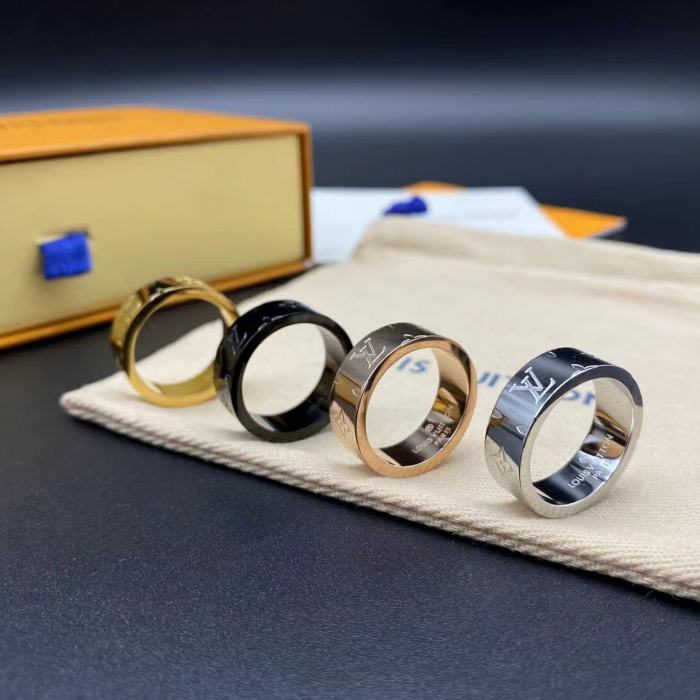 Wide edition embossed ring with logo letters