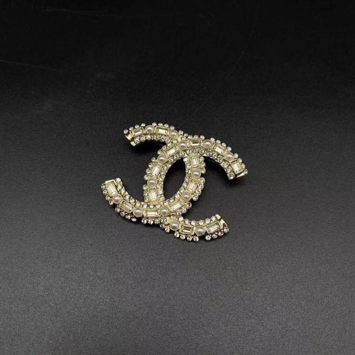 Diamond plated brooch