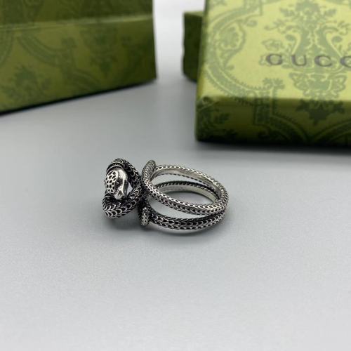 Double snake circling ring
