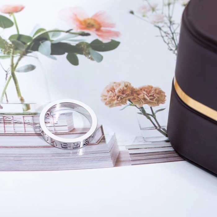 Single diamond letter ring