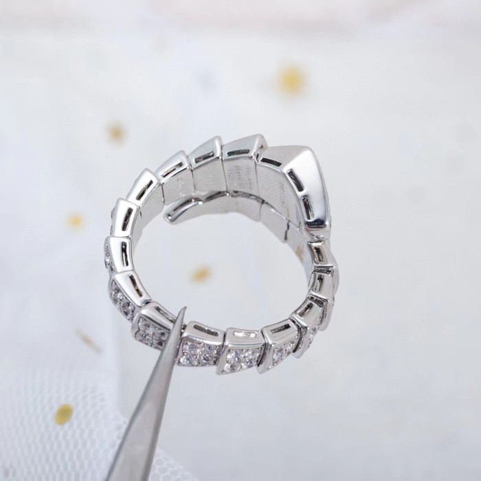 Serpentine diamond ring