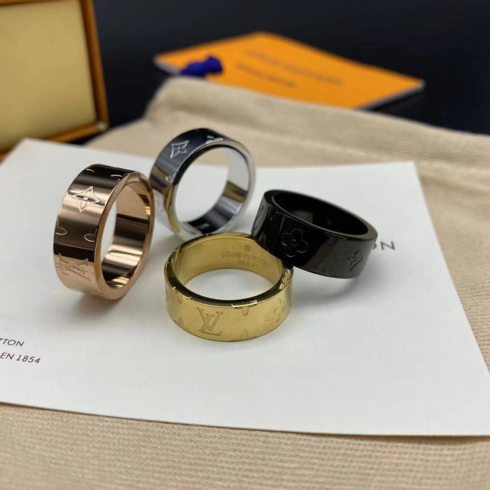 Wide edition embossed ring with logo letters