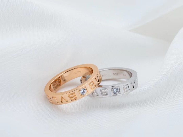 Single diamond letter ring