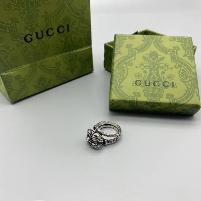 Double snake circling ring