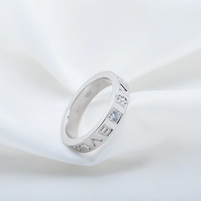 Single diamond letter ring