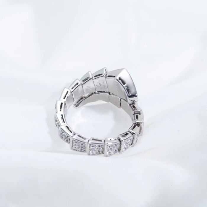 Serpentine diamond ring