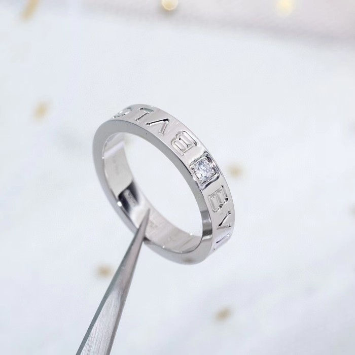 Single diamond letter ring