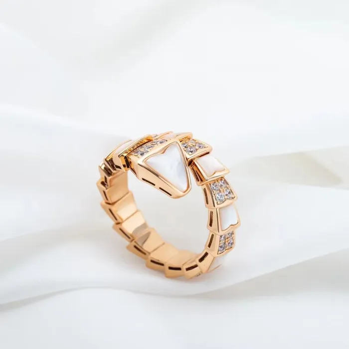 Serpentine diamond ring