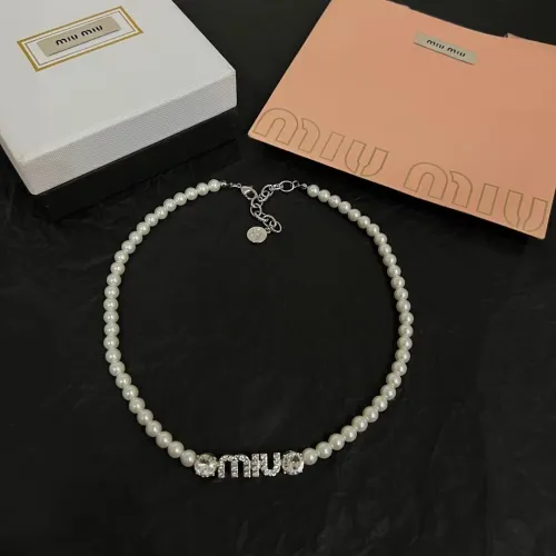 Logo studded with diamonds and pearls necklace