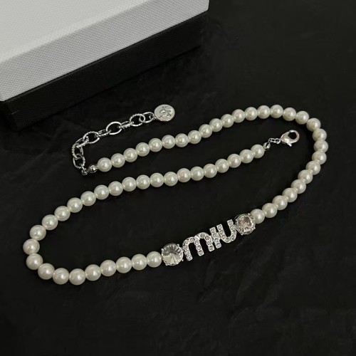 Logo studded with diamonds and pearls necklace