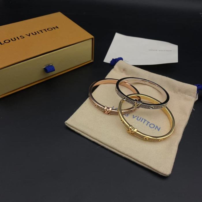 Tri color bracelet with diamond inlay