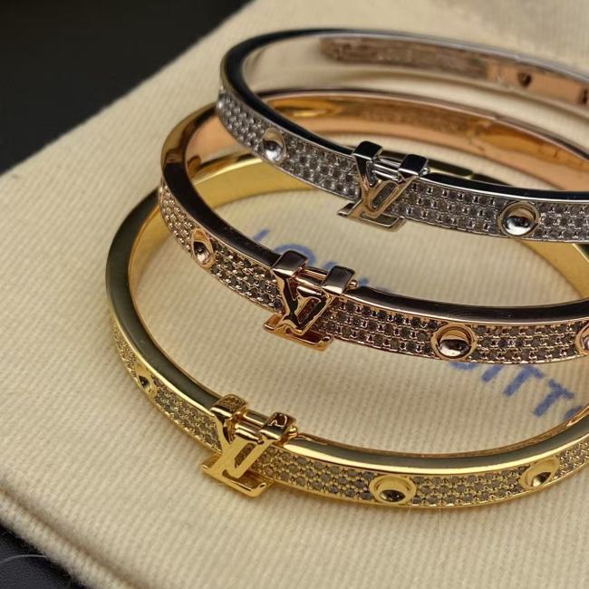 Tri color bracelet with diamond inlay