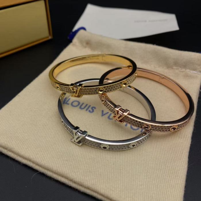 Tri color bracelet with diamond inlay