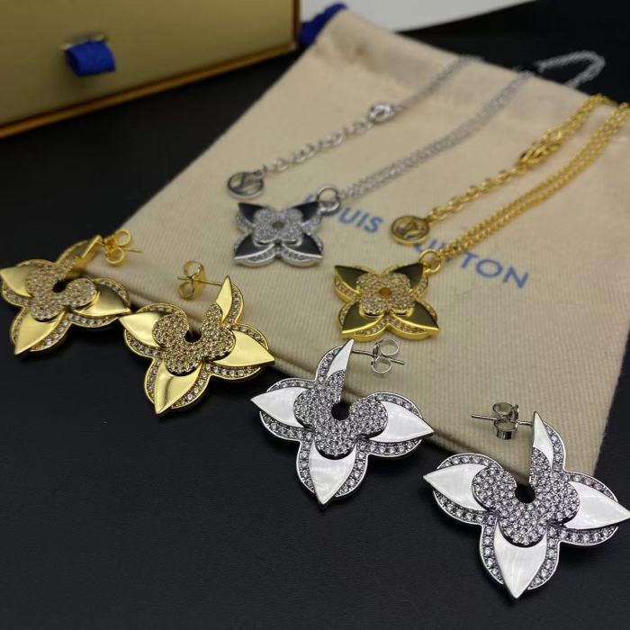 Small flower logo style necklace earrings