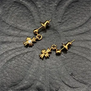 Gold plated small cross earrings