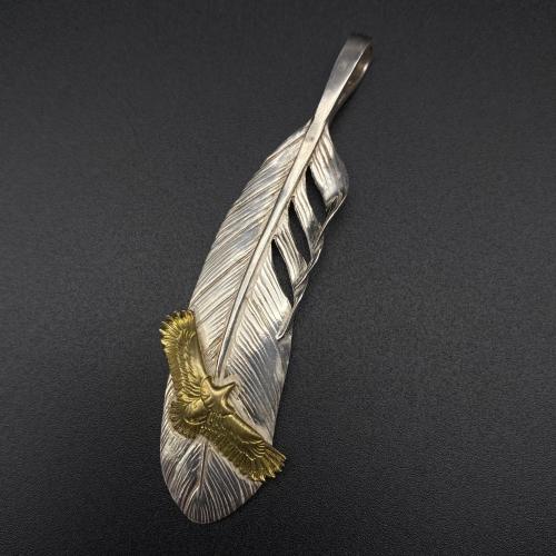Eagle inlaid with natural feathers