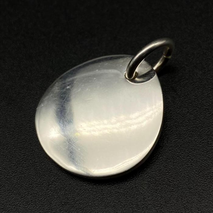 Round gold pendant