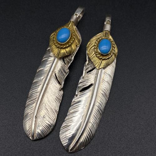 Golden leaf turquoise pigment feather