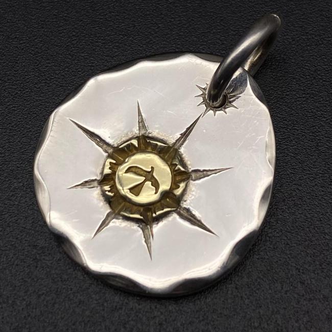 Round gold pendant