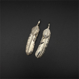 Silver leaf pigment feather