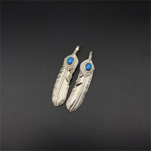 Turquoise pigment feather