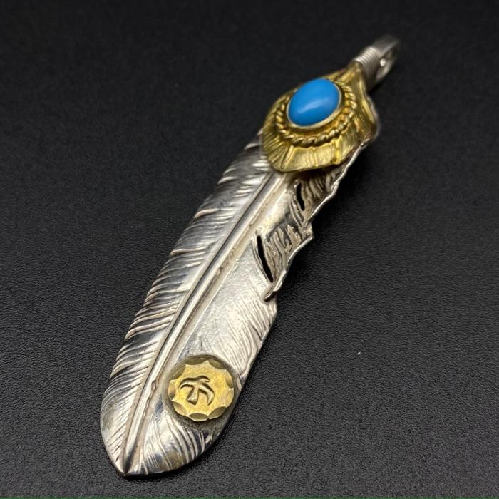 Turquoise, gold leaves, dots, gold feathers