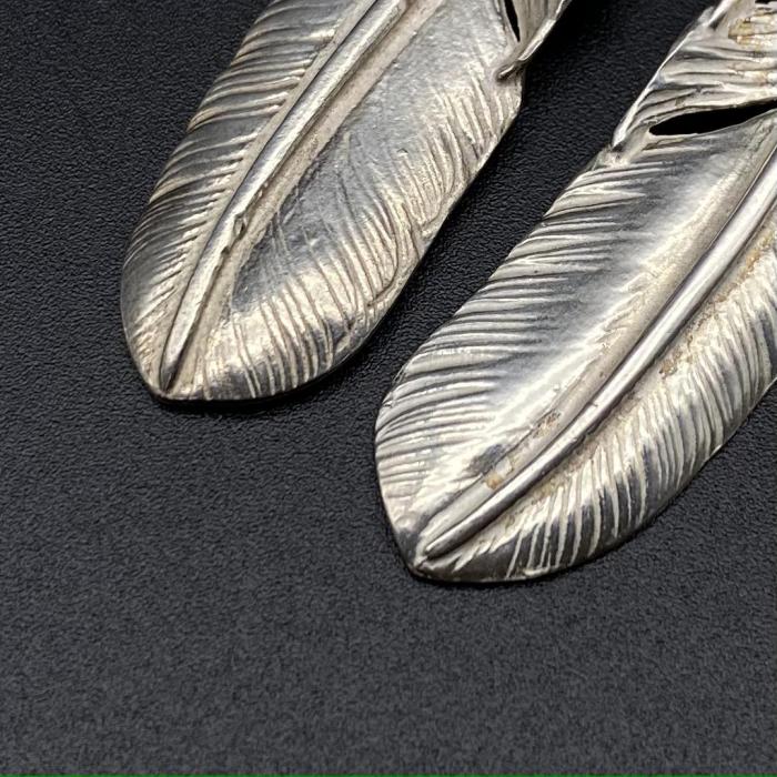 Silver leaf pigment feather