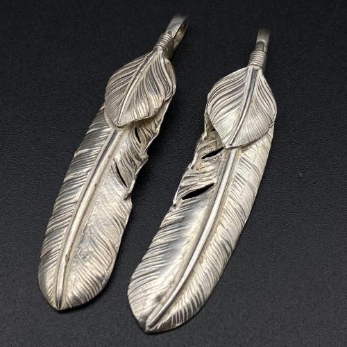 Silver leaf pigment feather