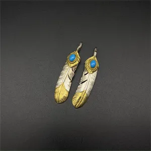 Turquoise, gold leaves, half gold feathers