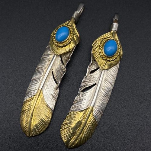 Turquoise, gold leaves, half gold feathers