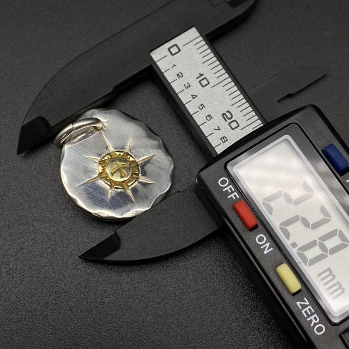 Round gold pendant