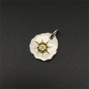 Round gold pendant