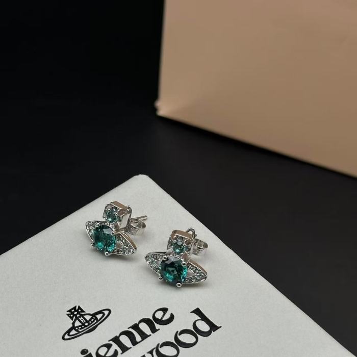 Emerald single diamond Saturn earrings