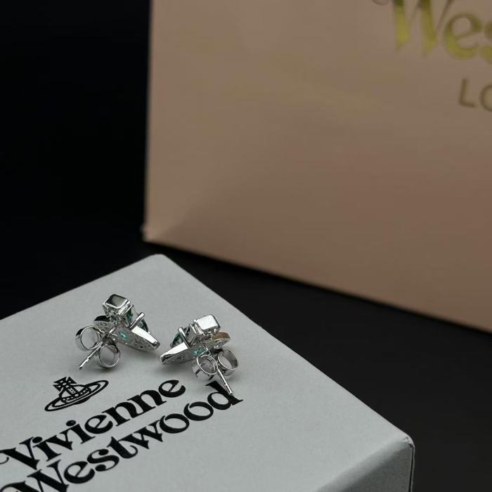 Emerald single diamond Saturn earrings